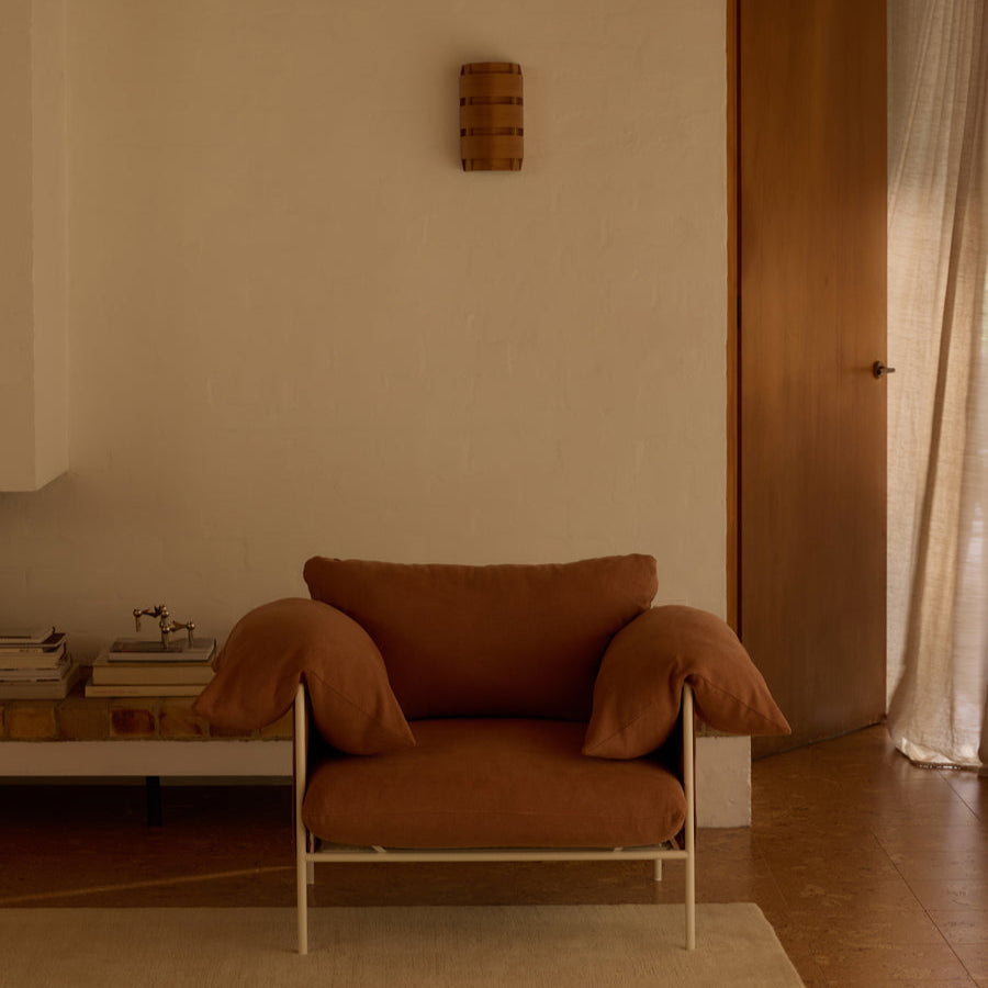 ELLISON STUDIOS. Alva armchair in rust cabarita hazel.