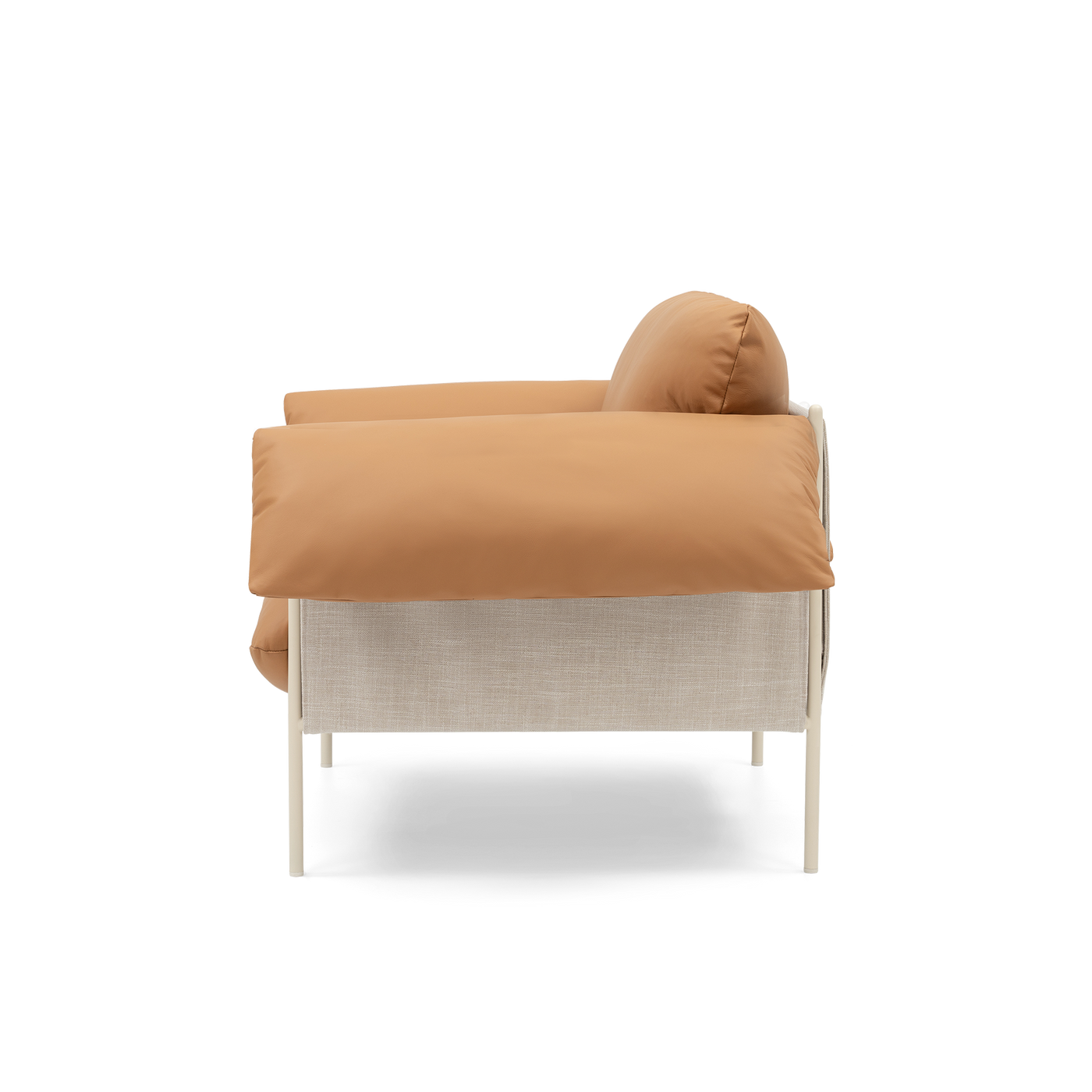 ELLISON STUDIOS. Alva Armchair in leather simpson tan swatch.