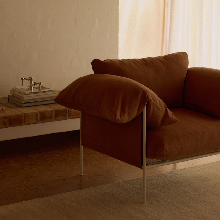 ELLISON STUDIOS. Alva armchair in rust cabarita hazel.