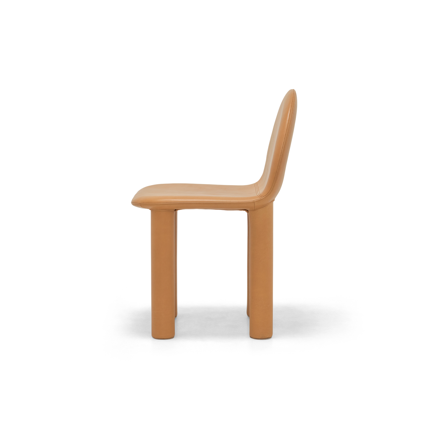 ELLISON STUDIOS. Arch Dining Chair in simpson tan leather