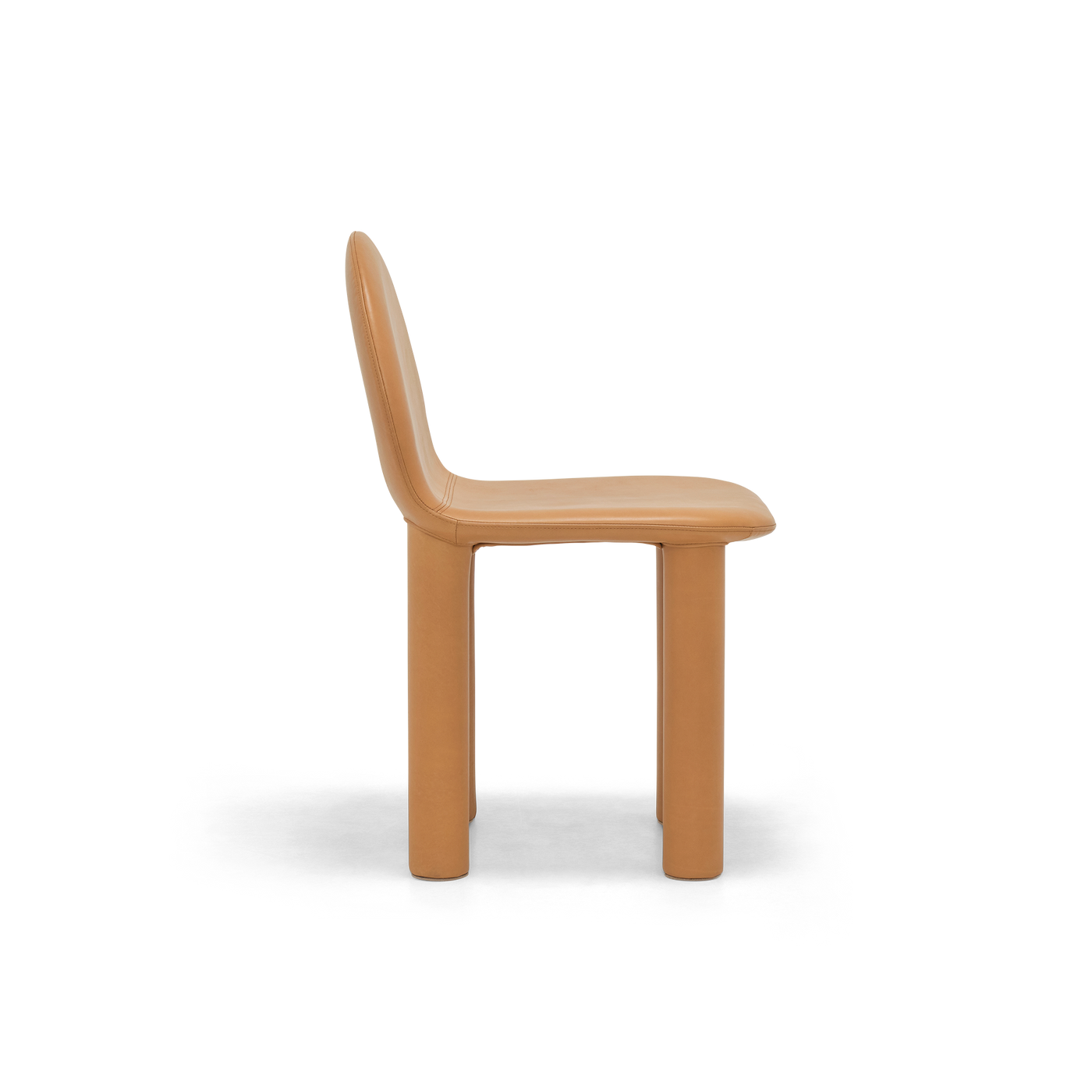 ELLISON STUDIOS. Arch Dining Chair in simpson tan leather